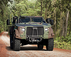 JLTV camo driving in forest