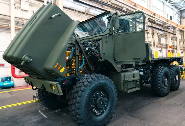 A Medium Tactical Vehicle Replacement (MTVR) undergoes depot-level rebuild at Production Plant.